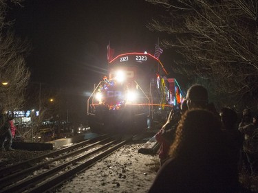 The CP Holiday Train arrives to make a stop at the Seventh Avenue Railway overpass in Saskatoon, December 6, 2015.