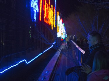 City councillor Darren Hill watches as the CP Holiday Train arrives to make a stop at the Seventh Avenue Railway overpass in Saskatoon, December 6, 2015.