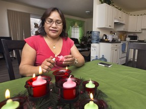 A thrilled Habitat Saskatoon home recipient  Marshia Tingot  moved into her home earlier this year, in a photo taken on Dec. 10, 2015.