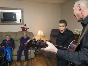 SASKATOON, SASK.; DECEMBER 11, 2015 - Brian and Ryan Kendall are a father-son duo who go around Saskatoon singing at a private care home,  December 11, 2015. Ryan has Prader-Willi Syndrome, a rare genetic spectrum disorder with varying side effects. (GordWaldner/Saskatoon StarPhoenix)