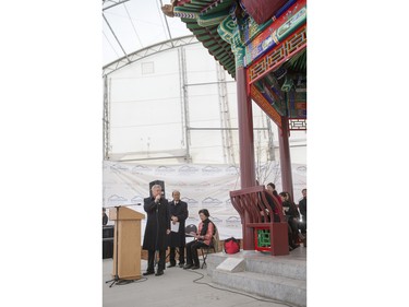General Wang Xingping, from the Consulate General of the People's Republic of China in Calgary, speaks during the unveiling of the new Chinese Ting artwork event in Victoria Park, December 12, 2015.