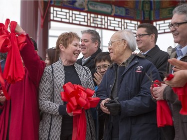 Saskatoon city councillor Pat Lorje and Dr. Ivan Jen during the unveiling of the new Chinese Ting artwork event in Victoria Park, December 12, 2015.