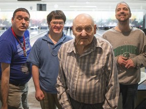 Light of the Prairies residents Norman Lapierre, left, John Fitzgerald, Donald Morrison and Clarke Potter pose for a photograph after bowling at Eastview bowling alley on Dec. 12, 2015.