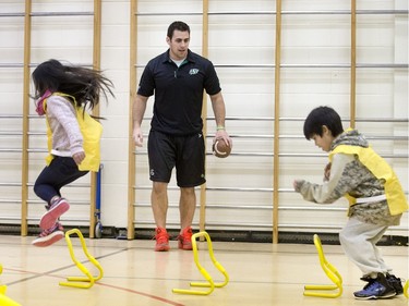 Saskatchewan Roughriders long snapper Jorgen Hus met with students at St. Edward School in Saskatoon as part of Build Our Kids’ Success, a free before-school program that promotes physical activity and good nutrition as part of a healthy lifestyle, December 16, 2015.