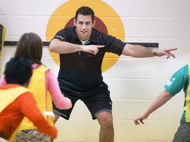 Saskatchewan Roughriders long snapper Jorgen Hus met with students at St. Edward School in Saskatoon as part of Build Our Kids’ Success, a free before-school program that promotes physical activity and good nutrition as part of a healthy lifestyle, December 16, 2015.