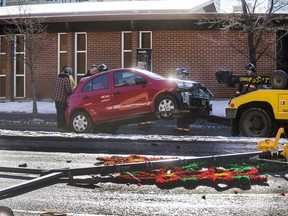 A car collided into a street traffic pole in the centre meridian on 25 th st. E. at 4th Ave. N. causing traffic delays eastbound, December 31, 2015.