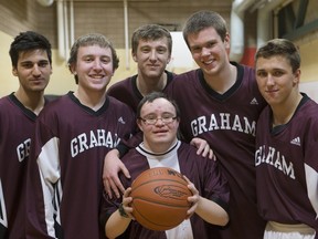 Patrick Traves and some of his Marion Graham teammates in the practice gym at BRIT.