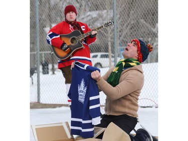 Winterlude is a free three-day festival outdoor celebration of the season with its focal point being a performance of the Canadian classic "The Hockey Sweater." Actor Gaelan Beatty with his sweater and Donovan Shcheirer with his guitar, December 2, 2015.