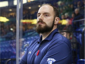 Saskatoon Blades athletic therapist James McDonald on the bench during a game at SaskTel Centre.