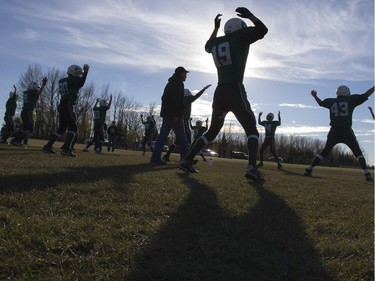 Game day warmups for the six-man Carrot River Wildcats football team coached by Cory Schmaltz which has been taken to the playoffs by skill, grit and determination, October 19, 2015.