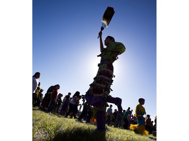 Aaliyan Lathlin dances in the sun with 4,500 students with Saskatoon Public Schools' First Nations and the Wa Paha Ska School on the Whitecap Dakota First Nation on the sports grounds, September 30, 2015.