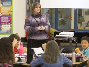 Lori Steward, community relations manager from Global Gathering Place, speaks to students at Brownell School involved in We Day activities regarding incoming Syrian refugees and how they can help on Monday, December 07, 2015.