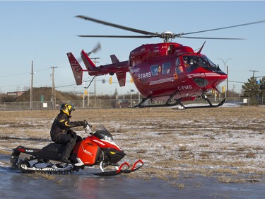 STARS Air Ambulance Saskatoon stages a mock rescue of an injured snowmobiler at the airport, December 8, 2015.