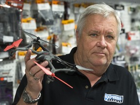 Warren Collins, owner of Express Hobbies, says drones have been a bigger seller this holiday season.