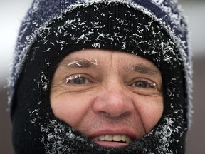 Albert Kroll was a little frosty while walking near the 14th Street East as temperatures stayed in the negative double digits on Tuesday, only hitting a high of -13 C.