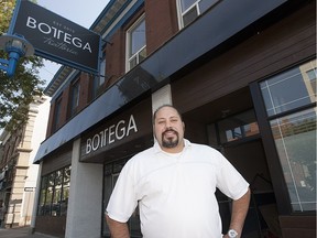 Amadeo Vallati, pictured in front of Bottega Restaurant in 2013, pleaded guilty on Thursday to fraud by writing bad cheques to Real Canadian Wholesale while he was managing the restaurant.