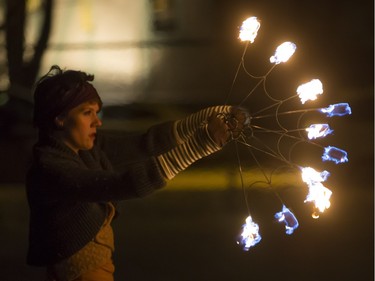 Fire dancers perform at Victoria School as part of the Winterlude festival, December 3, 2015. The event runs to December 5.
