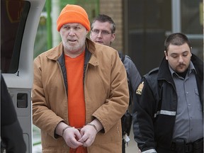 Raymond Lindsay is taken from Queen's Bench Courthouse after being sentenced Monday, November 25, 2013.