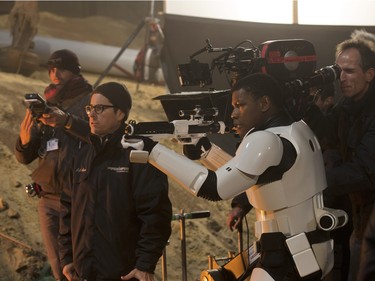 Director J.J. Abrams (L) with actor John Boyega on the set of "Star Wars: The Force Awakens."