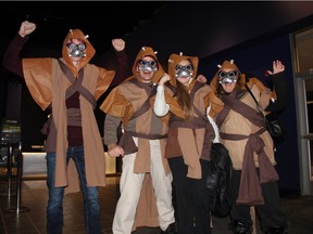 "The sand people are easily startled, but they'll soon be back and in greater numbers." While many chose costumes based on the some of Star Wars main characters, like Darth Vader and Obi-wan, this group of fans, which include Darryl Ludwig and daughter, Quidje-Bo Ludwig, centre, tailored their costumes after the Tusken Raiders.