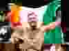 LAS VEGAS, NV – DECEMBER 12: Conor McGregor celebrates after a first-round knockout victory over Jose Aldo in their featherweight title fight during UFC 194 on December 12, 2015 in Las Vegas, Nevada.