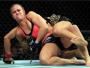 Felice Herrig and Paige VanZant (left) grapple in their women's strawweight bout during the UFC Fight Night event at Prudential Center on April 18, 2015 in Newark, New Jersey.