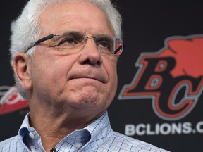 B.C. Lions head general manager Wally Buono pauses for a moment during a news conference at the teams practice facility in Surrey, B.C., on Monday, Nov. 17, 2014. The CFL team says Buono will take over as coach next season.