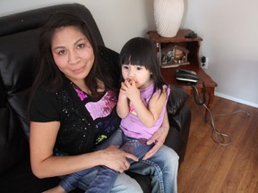 Agatha Rose Eaglechief, can be seen with her two-year-old daughter Avez Ivy Rose Eaglechief at their Confederation Park home on Tuesday afternoon. Eaglechief says she would like to see a curfew implemented for all high school-aged students in Saskatoon to help prevent crime in city.