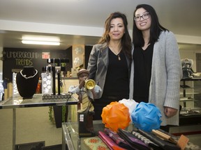 Noy Phonsavath, left, and her daughter, Anessa, in their recently opened second-hand and consignment store, Underground Trends.