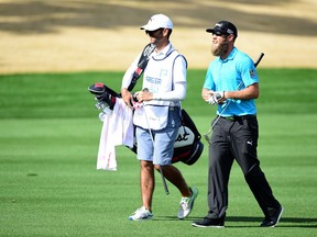 Graham DeLaet of Canada walks to the 16th green after his second shot during the first round of the CareerBuilder Challenge In Partnership With The Clinton Foundation on the Jack Nicklaus Tournament course at PGA West on Jan. 21, 2016 in La Quinta, California.