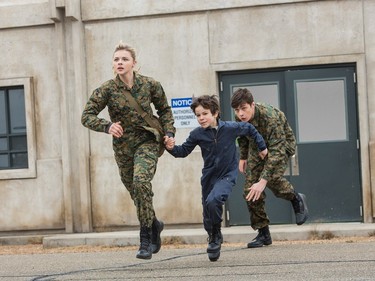 Chloë Grace Moretz, Zackary Arthur and Nick Robinson star in "The 5th Wave."
