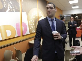 Former UFC champion Chris Weidman talks to reporters at the state Capitol, Tuesday, Jan. 26, 2016, in Albany, N.Y.