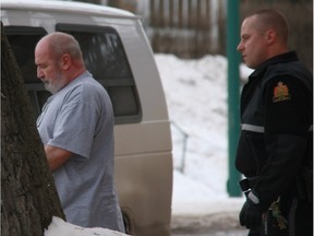 Daniel Smith, 59, leaves Prince Albert Court of Queen's Bench on Friday, Jan. 30, 2016. A jury found him guilty of second-degree murder in the 2010 death of ATM technician Roger Byer.