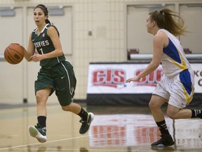 University of Saskatchewan Huskies guard Desarae Hogberg moves the ball against the University of British Columbia Thunderbirds in a game from Saturday, November 21st, 2015.