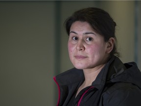 Teaching assistant Cynthia Lemaigre poses for a photograph at the La Loche community hall and hockey rink on Jan. 23, 2016.