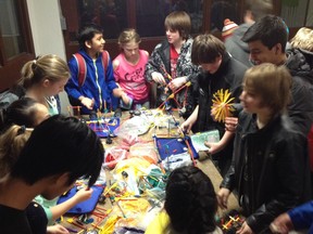 Students experiment at the K'NEX station at Cameco Spectrum 2016.