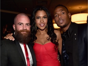 L-R: Director Michael Tiddes, actors Kali Hawk and Marlon Wayans attend the after party for the premiere of Open Road Films' "Fifty Shades of Black" at Regal Cinemas L.A. Live on January 26, 2016 in Los Angeles, California.