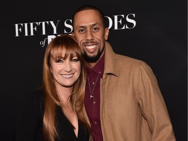Actors Jane Seymour and Affion Crockett attend the premiere of Open Road Films' "Fifty Shades of Black"  at Regal Cinemas L.A. Live on January 26, 2016 in Los Angeles, California.