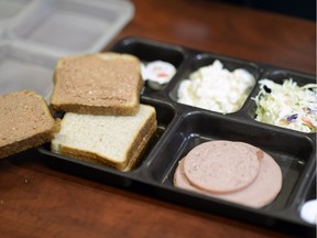 Saskatchewan Ministry of Corrections and Policing spokesman Drew Wilby displayed an exact meal prepared for inmates at the Regina Correctional Centre