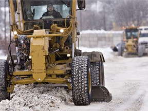 Snow clearing and rut shaving of 17th Street in between Avenues H and P took place December 18, 2012 in Saskatoon.