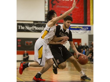 Archbishop O'Leary Spartans' Tristen Kamal moves the ball against the Garden City Collegiate Fighting Gophers at the annual BRIT basketball classic, January 9, 2016.