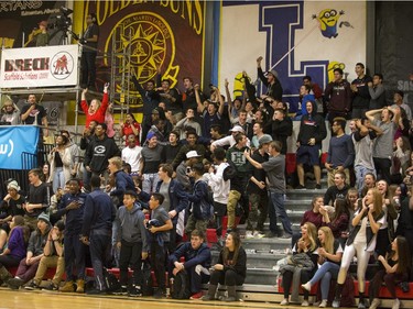 The crowd cheers as the Archbishop O'Leary Spartans take on the Garden City Collegiate Fighting Gophers at the annual BRIT basketball classic, January 9, 2016.