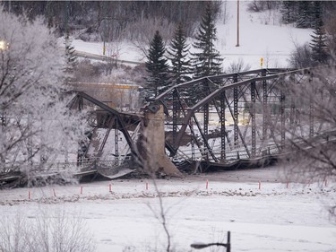 The first two sections of the Traffic Bridge are demolished with explosives on  January 10, 2016.