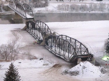 The first two sections of the Traffic Bridge are demolished with explosives on  Jan. 10, 2016.