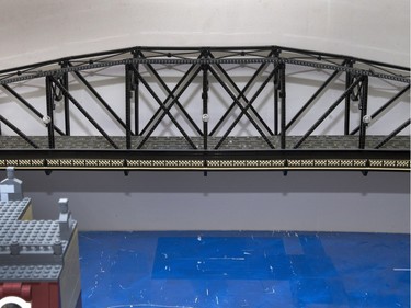 Andre Lalonde has made a Traffic Bridge replica out of Lego to go along with the rest of his train display.
