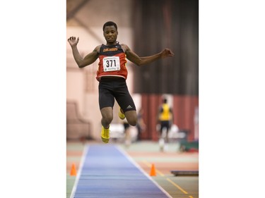 Josh Rizkalla from the University of Calgary competes in the triple jump during the Sled Dog Open at the Saskatoon Field House, January 16, 2016.