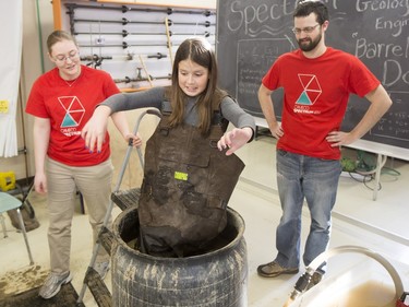 Ayvrn Rutten, age 10, checks out a demonstration called the barrel of doom at Spectrum at the College of Engineering of the University of Saskatchewan campus on January 17, 2016.