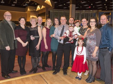 A Ukrainian New Year celebration at TCU Place with (L-R)  Dean and Deb Yaremchuk, Cres and Rob Heggie, Christine Rudneski, Blair, Joel and Ava Heggie, (back) Adam Gudmundson, Quinn, Nevach, Breeann, Tash and Kyle Heggie, January 15, 2016.