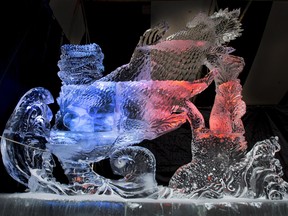 Ice sculptor Doug Lingelbach's sculpture of the legendary Coelacanth is backlit with coloured lights at the Saskatoon Farmers' Market Wintershines site on Jan. 25, 2016.
