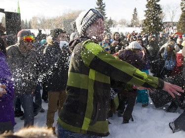 Participants attempt to break the world record for the world's largest snowball fight on Sunday, Jan. 31, 2016.